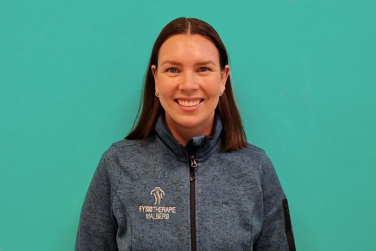 Fysiotherapeut van Fysiotherapie Malberg in bedrijfskleding